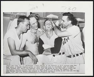 Triumphant Tigers-- Heroes in the Detroit 13 to 6 victory over New York today at Yankee Stadium gather in their dressing room to celebrate. Left to right: first baseman Gail Harris who homered; Eddie Yost who drove in six runs with a single and two homers; winning pitcher Frank Larry who makes a career of beating the Yankees, and left fielder Charlie Maxwell who singled in the fifth inning to drive in two runs and tie score, 2-2.