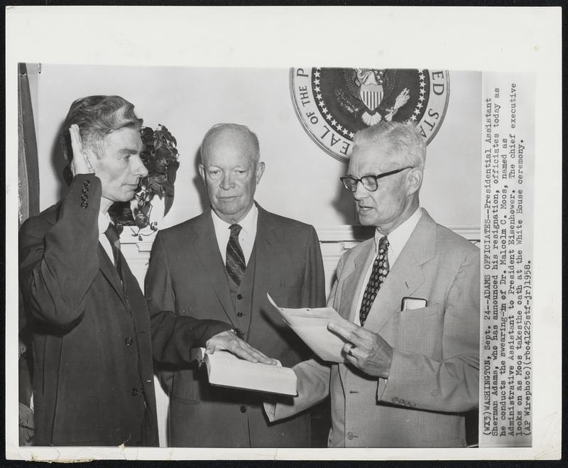 Adams Officiates--Presidential Assistant Sherman Adams, who has announced his resignation, officiates today as he conducts the swearing-in of Dr. Malcolm C. Moos, named as Administrative Assistant to President Eisenhower. The chief executive looks on as Moos takes the oath at the White House ceremony.