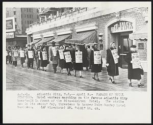 Parade of Hotel Strikers. Hotel workers marching on the famous Atlantic City boardwalk in front of the Ritz-Carlton Hotel. The strike now in its second day, threatens to hamper Palm Sunday hotel business.