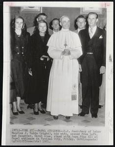 Papal Audience – U.S. Secretary of Labor Maurice J. Tobin (right), his wife, second from left, and daughter, Carol Anne, stand with Pope Pius XII at Papal audience in Vatican City, Friday.