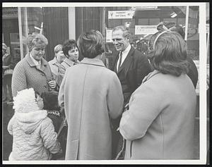 Mayor White talking to people on Broadway in S. Boston