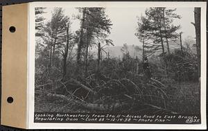 Contract No. 66, Regulating Dams, Middle Branch (New Salem), and East Branch of the Swift River, Hardwick and Petersham (formerly Dana), looking northwesterly from Sta. 11, Access Road to east branch regulating dam, Hardwick, Mass., Dec. 14, 1938