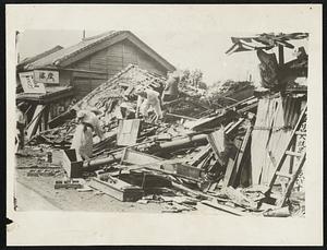 Seeking Their Dead: The Yokohama Horror... Showing Japanese seeking for dead and injured relatives in the ruins of their homes, a few hours after the terrible earthquake in Japan.