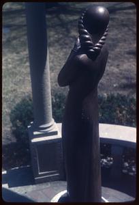 A sculpture from the back