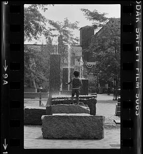 Boy and fountain Inn Street