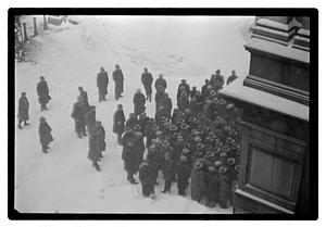 A group of people outside in the snow