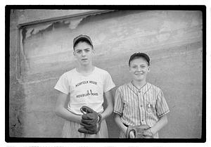 Two boys with baseball gloves
