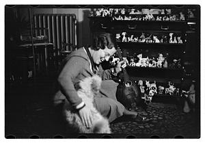 Miss Liddie A Livevey, collector of miniature dogs, 400, 1 live one