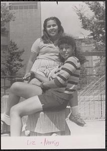 Liz and Nancy posing outside