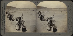 Native boys spinning cotton