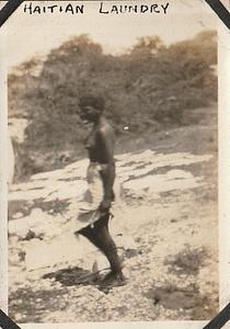 Woman doing laundry in Haiti