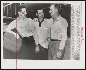 Tigers Now Indians-- Former Detroit Tigers pitcher Bill Wight, catcher Joe Ginsberg and infielder Owen Friend (left to right), shown at Briggs Stadium today where they packed their belongings to join their new teammates, the Cleveland Indians. Trade involved a four player swap between the two clubs. The Indians also got pitcher Art Houtteman who took off for New Jersey, his wife's home, at first word of the trade. The Cleveland ball club gave up shortstop Ray Boone and pitchers Steve Gromek, Dick Weik and Al Aber.