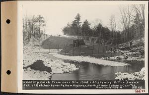 Contract No. 44, Extension of Belchertown-Pelham Highway, New Salem, Orange, looking back from near Sta. 1042+40 showing fill in swamp, New Salem, Mass., Feb. 6, 1934