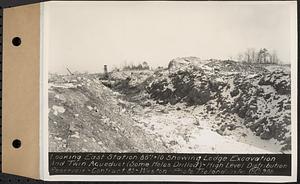 Contract No. 80, High Level Distribution Reservoir, Weston, looking east Sta. 887+10 showing ledge excavation and twin aqueduct (some holes drilled), high level distribution reservoir, Weston, Mass., Jan. 23, 1940