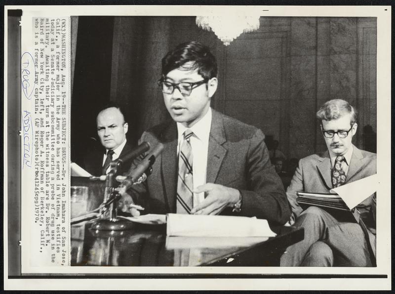 The Subject: Drugs--Dr. John Imahara of San Jose, Calif., a former major in the Army who has served in Vietnam, testifies today at a Senate Judiciary subcommittee during a probe of drug use in the military. Awaiting their turn at the witness table are Dr. Robert W. Baird of New York City, left, and Roger A. Roffman of Berkeley, Calif., who is a former Army captain.