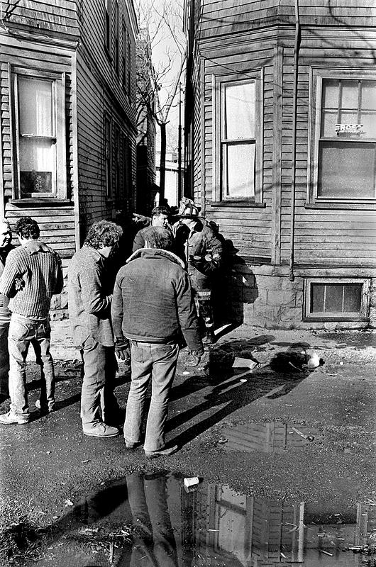 Fire Prevention firefighter John Kanarkiewicz, Lt. Pat Dunn, and State Fire Marshall O'Keefe collecting evidence