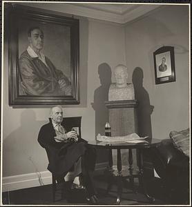 Serge Koussevitzky seated under his portrait