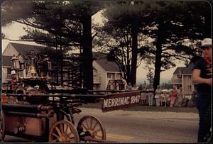 Antique hand pumper Merrimac 1847 in parade