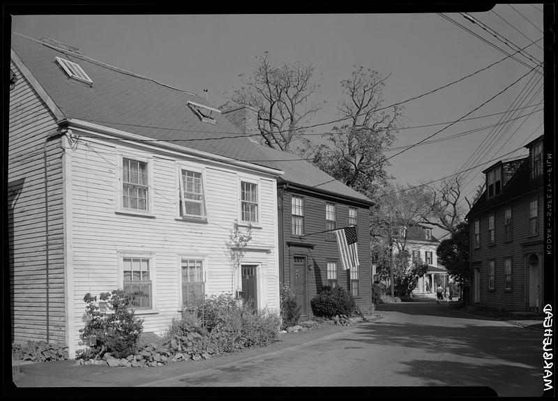 Marblehead, Franklin Street, door yards with flag Digital Commonwealth
