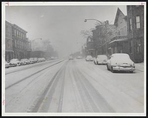 No Parade, No Nothing, but snow! This is what this street looked like just before 30,000 marchers were to have stepped off today in South Boston's annual St. Patrick's Day parade. Last Saturday, the real St. Patrick's day, the same thing happened, too. There's just nothing to do but keep trying until we get a pleasant, spring like Saturday.