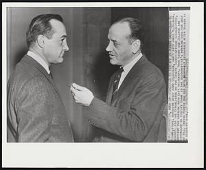 Scheduled to Testify in Peress Case - John G. Adams, right, outgoing chief Army Counselor, chats with James N. Juliana counsel for The Republicans on The Senate Investigation Subcommittee, outside the hearing room late yesterday. Both Adams and Juliana are scheduled to testify today in the subcommittee's hearing into the case of Maj. Irving Peress who had been honorably discharged after tabbed as a security risk.