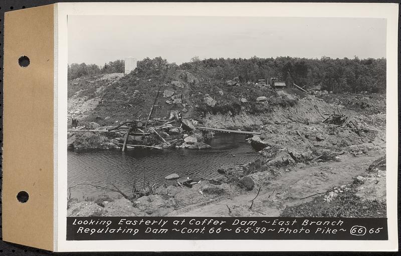 Contract No. 66, Regulating Dams, Middle Branch (New Salem), and East Branch of the Swift River, Hardwick and Petersham (formerly Dana), looking easterly at coffer dam, east branch regulating dam, Hardwick, Mass., Jun. 5, 1939