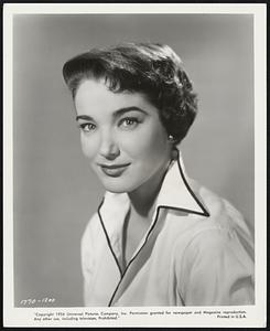 Julie Adams..has the leading feminine role opposite Tony Curtis and George Nader in Universal-International's fast-paced melodrama "Six Bridges To Cross". The picture is a screen adaptation of the Collier's magazine story by Joseph Dinneen.