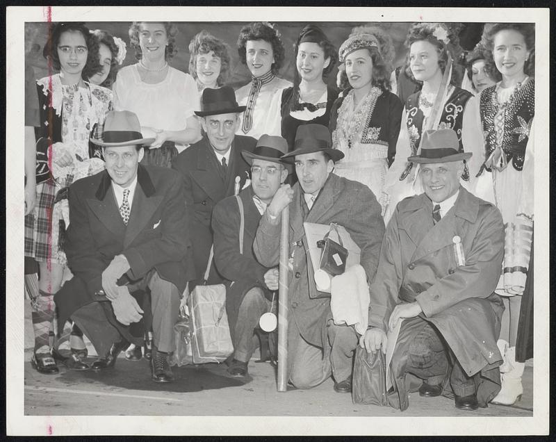 Off to London – Gov. Tobin and his official party at the Bedford airport. Flanked by girls dressed in costumes representing all the United Nations, members of the party are, left to right, the Governor, Orson Adams, Jr., Erwin D. Canham, George H. Perkins and Dr. Karl T. Compton.