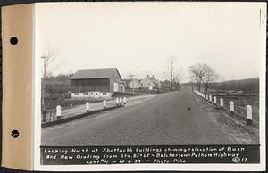 Contract No. 41, Extension of Belchertown-Pelham Highway, Belchertown, Pelham, looking north at Shattuck's buildings showing relocation of barn and new grading from Sta. 83+65, Belchertown and Pelham, Mass., Dec. 6, 1934