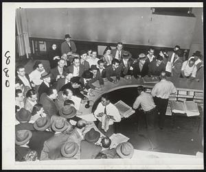 Philadelphians Jam Newspapers Offices to get their copies of today's papers as striking AFL truck drivers halt distribution. Picket lines were thrown around the Inquirer (where this picture was taken) and the Record last night and around the Bulletin today.