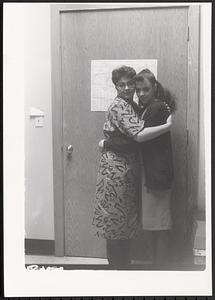 Giselle and her mother hugging