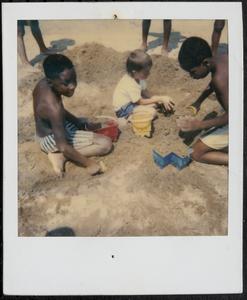 Boys playing in the sand