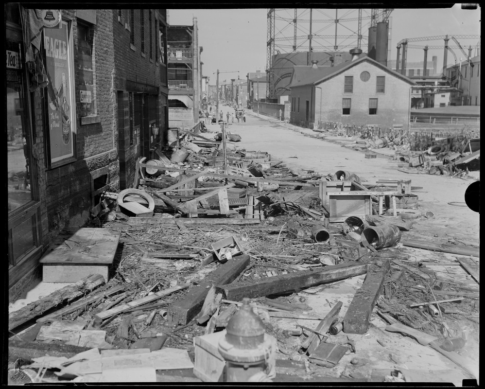 Debris in street near gas tanks, Hurricane of 38