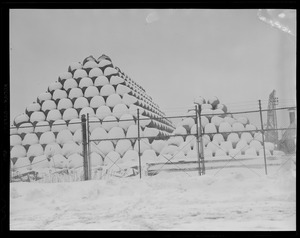 Stacked buoys covered in snow
