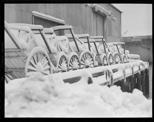 Snow covered hand carts, Boston waterfront