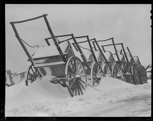Snow covered hand carts, Boston waterfront