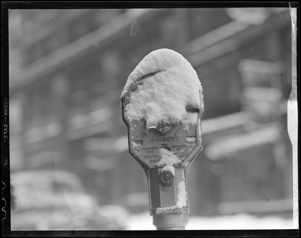 Snow covered parking meter, Boston