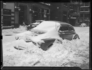 Snow covered cars