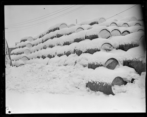 Snow covered barrels