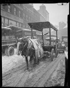 Horse and cart on snowy Boston street