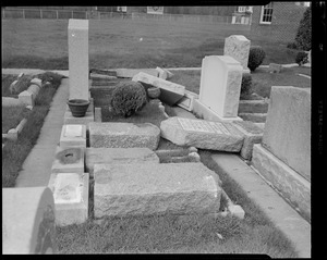 Cemetery gravestones knocked over
