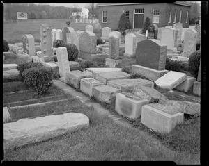 Cemetery gravestones knocked over