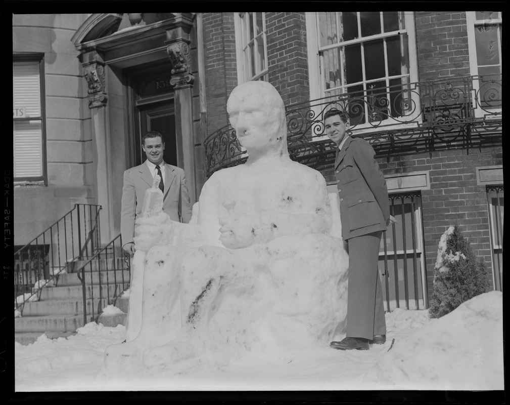 Harvard men pose with John Harvard snowman