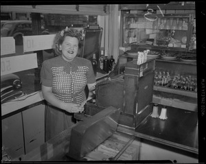 Woman at work in lunch counter