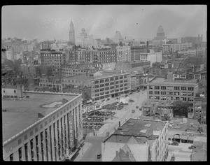 Bird's eye view of Boston shooting east from top of new gas building in Park Square near Arlington and Stuart Street (2), one shot of Motor Mart (garage)
