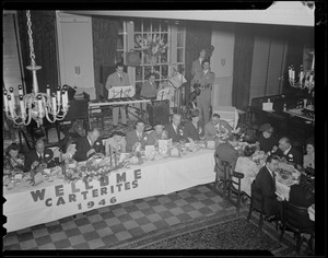 Sign on table says "Welcome Carterites, 1946" for Carter Hotels dinner at Hotel Avery