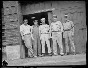 Five men outside J.A. Stubbs