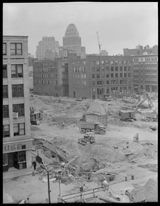 View from Albany St. toward United Shoe Building showing underpass work going on where the Old United States Hotel once stood.