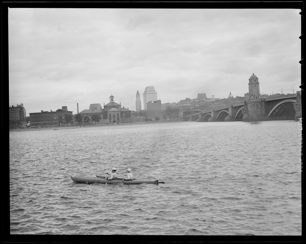 Skyline from Charles River at Longfellow Bridge (2 people canoeing appear in the foreground)
