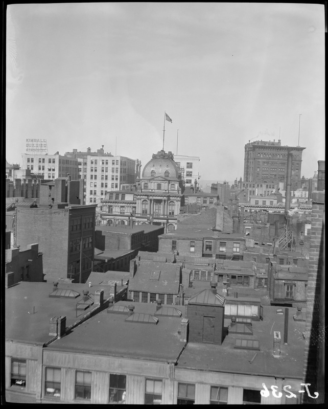 Bird's eye view over Boston rooftops showing City Hall